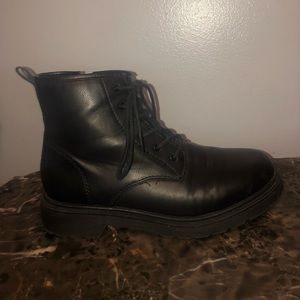 Black combat boots with zipper on the side